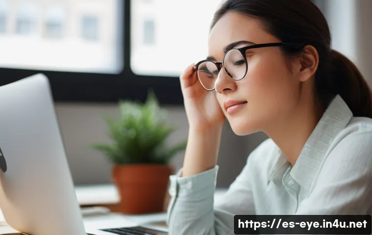 눈 충혈 치료법 - A close-up portrait of a young adult woman in a cozy indoor office setting, wearing stylish eyeglass...